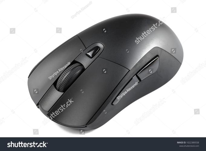 Black mouse in use on white surface