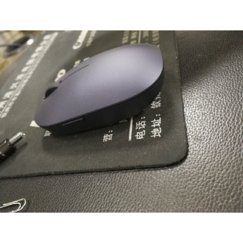 Compact wireless office mouse close-up