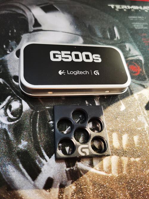 Black gaming mouse with blue accents technical view