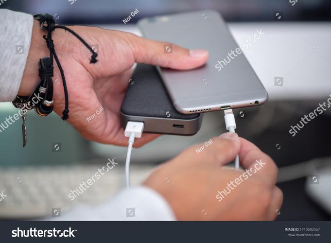 Black wireless mouse charging setup