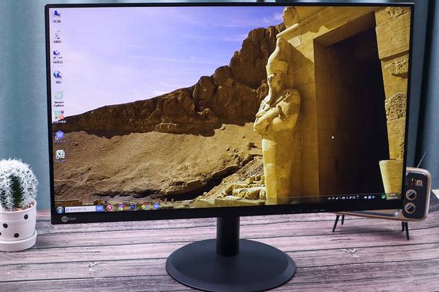 Person working on monitor in office environment