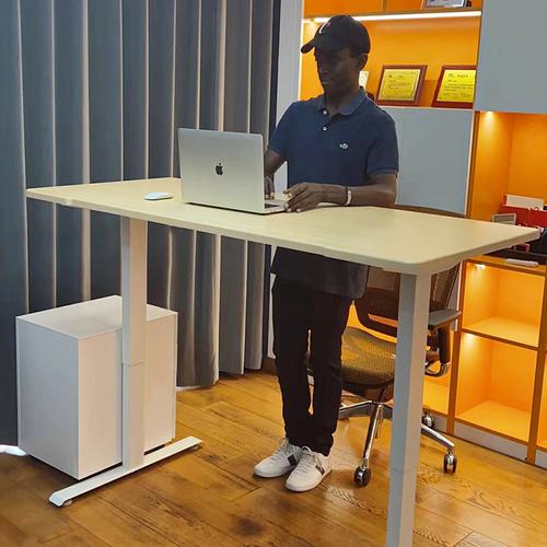 Office worker deciding on monitor purchase