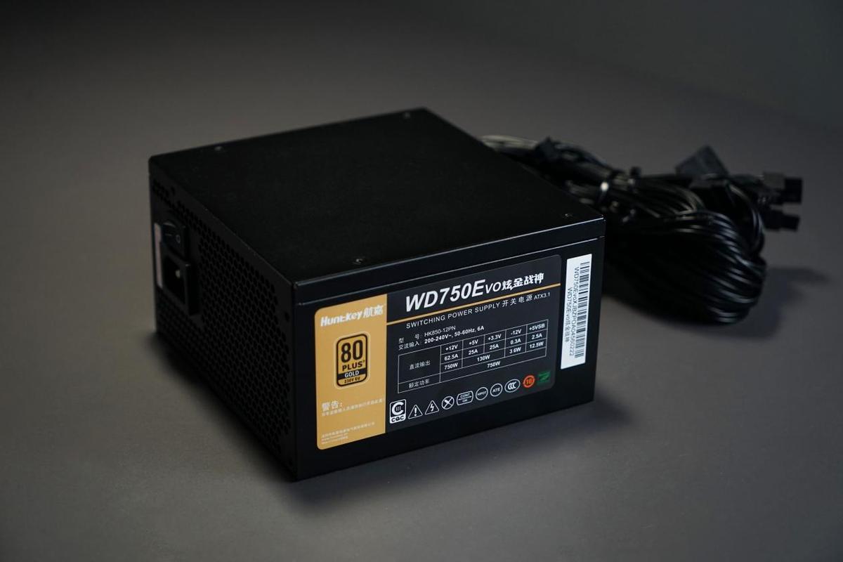 Black computer power supply unit with cables