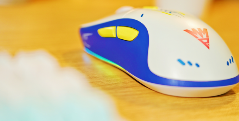 Close-up computer mouse on desk showing technical build