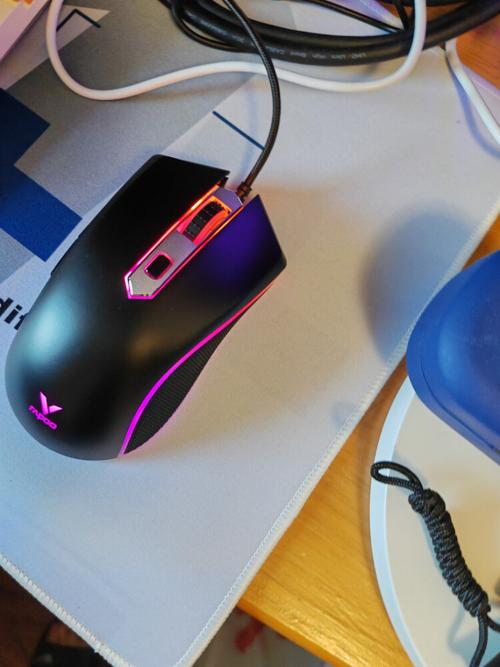 Player using wired gaming mouse