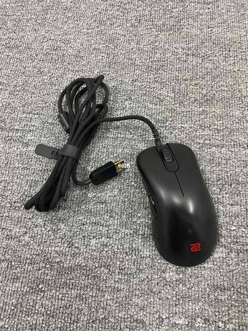 Gamer using mouse in FPS gameplay