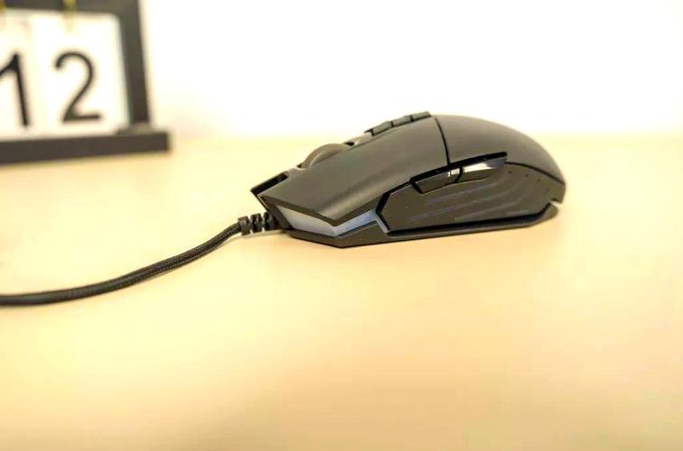 RGB mouse on gaming setup desk