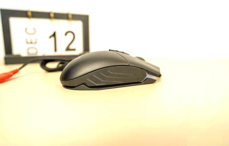 Gaming mouse RGB lighting and buttons detail