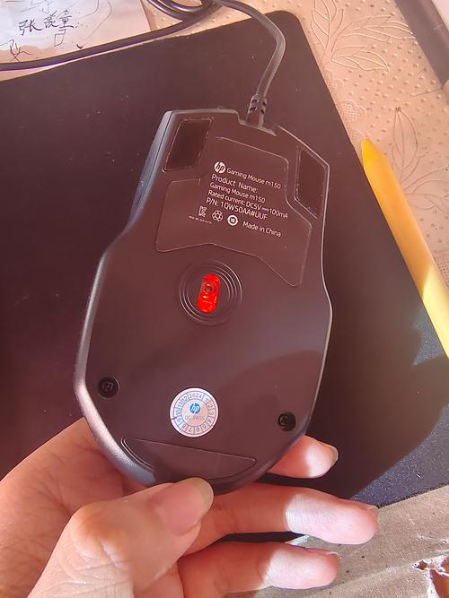 Corded mouse on mouse pad showing cable setup