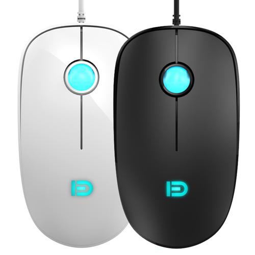 Wired mouse in use on office desk