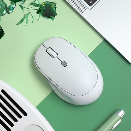 Black wireless mouse on desk