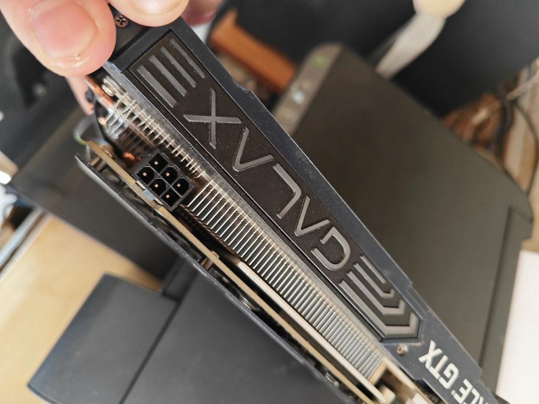 Graphics card installed on motherboard showing specs