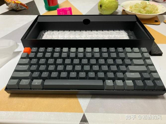 Person using backlit mechanical keyboard at night