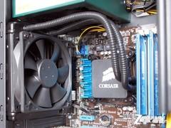 Computer components inside black PC case with fans