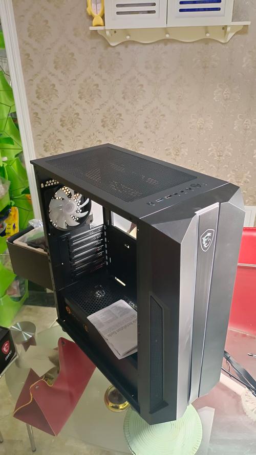Open computer case with fans and graphics card