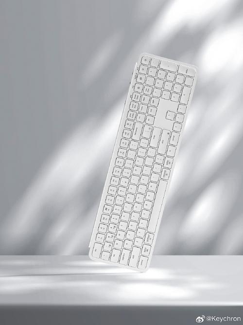 User using keyboard at desk