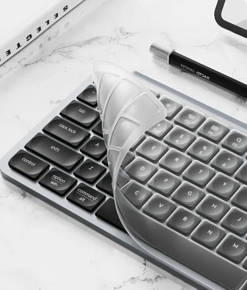 Keyboard on desk with laptop charging