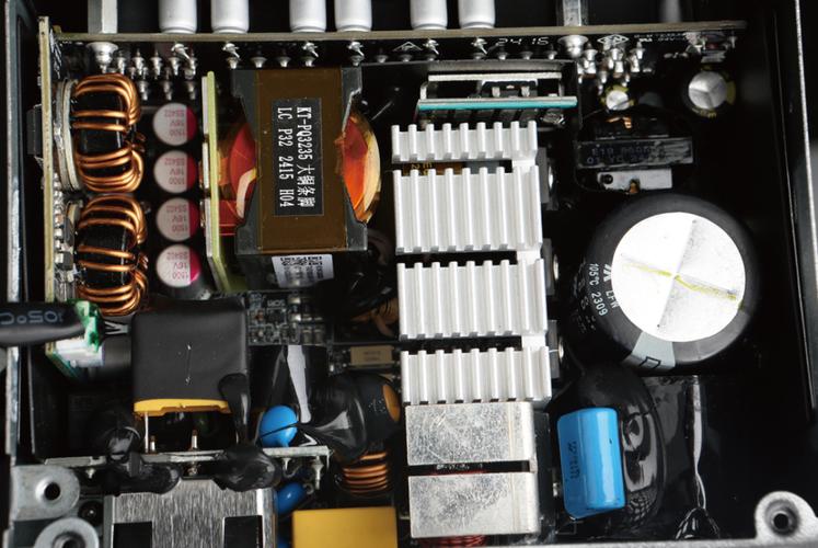 Close-up of computer cooling fans and heat management in PSU