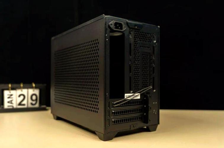 Black compact PC case close-up