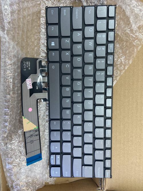 User setting up laptop keyboard