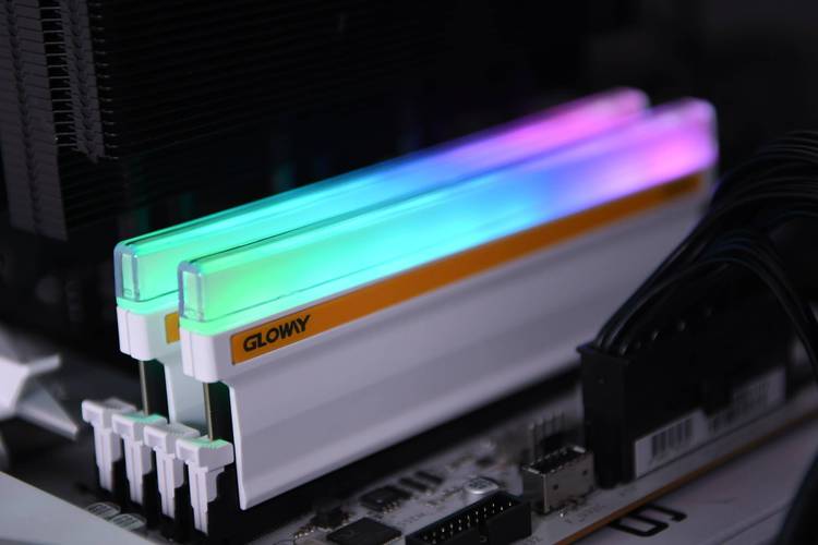 Person installing SSD in gaming setup