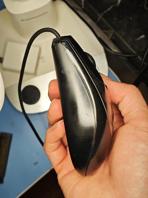 Close-up of mouse sensor and buttons