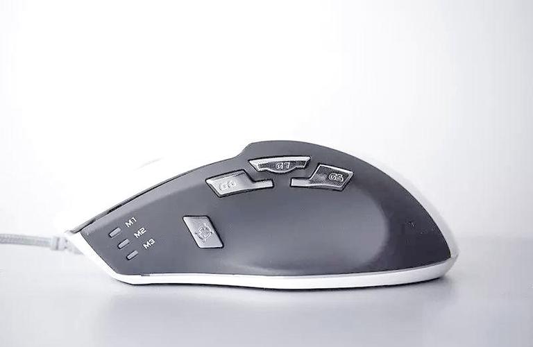 White gaming mouse on desk