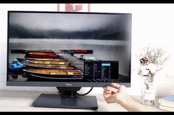 Designer working on color-accurate monitor
