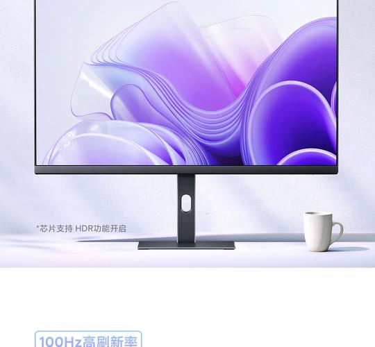 现代办公桌上的27英寸显示器侧面