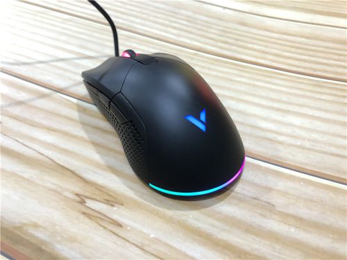 Gaming mouse in use during gameplay