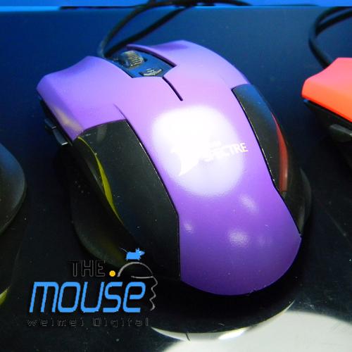 Gaming mouse on desk with RGB lighting