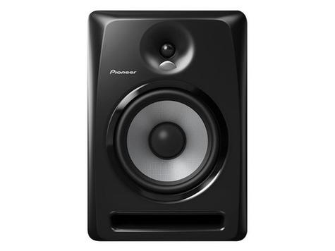 Person listening to music with speakers