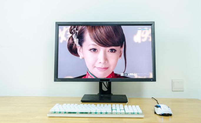 Designer working on computer with monitor