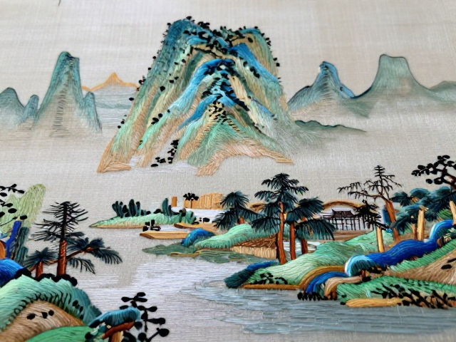 细节刻画与整体气韵:微观针法与宏观布局的统一