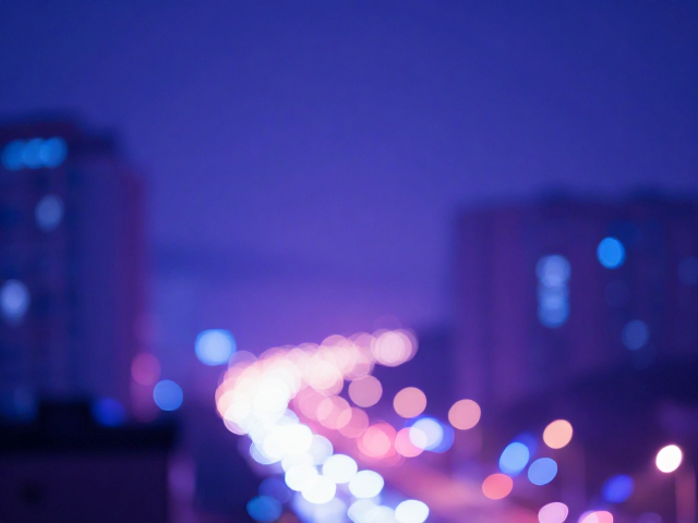 蓝紫夜色中灯光虚化的视觉美学基础