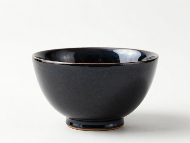 青釉保护坯体,黑釉色古韵,揭秘陶瓷釉面工艺与养护秘籍
