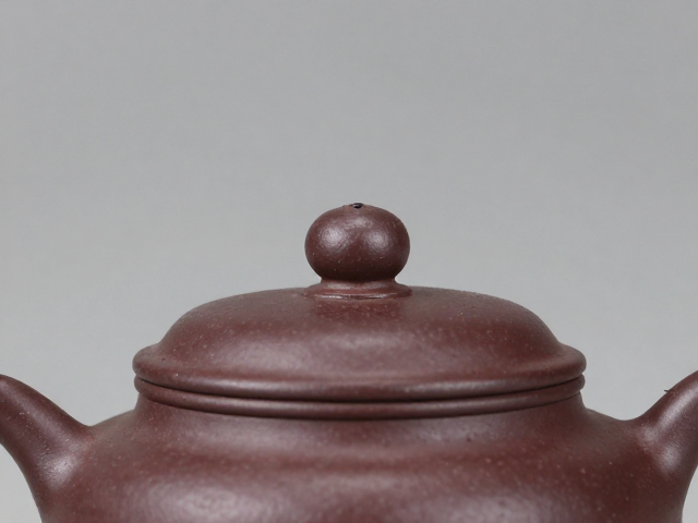 玲珑瓷壶钮紫砂壶适合泡乌龙茶吗？揭秘材质与茶性的SEO优化指南