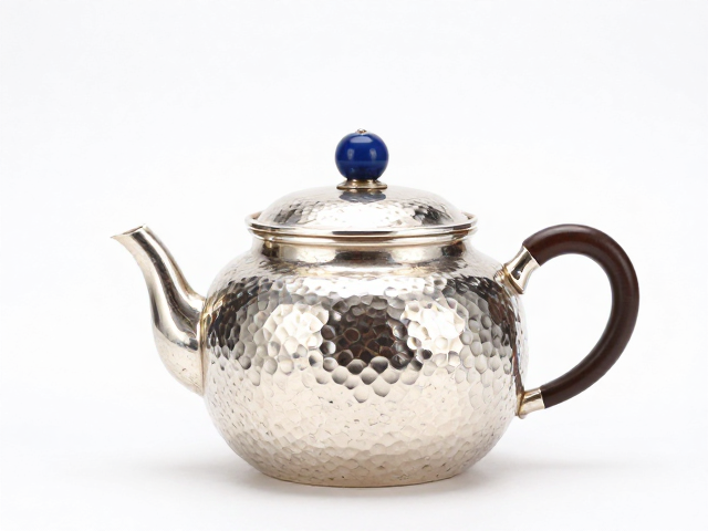 银壶一张打成型工艺揭秘，景泰蓝金属茶具的锤揲之美