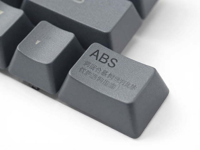 尼龙纯色键帽激光雕刻工艺解析，ABS混合基材的优势与选购指南