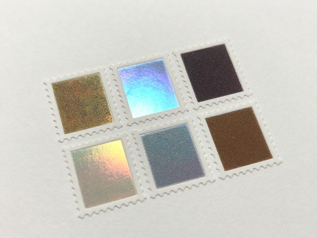 高端定制邮票有背胶吗?现代PVA胶印刷效果解析