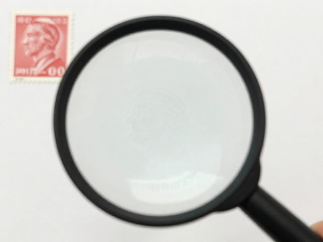 全新全品邮票怎么看水印？高倍放大镜教你搞定模糊难题