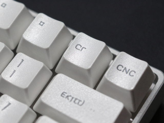 CNC精密切削轻量化铝合金键帽,抛光镜面工艺提升电竞手感