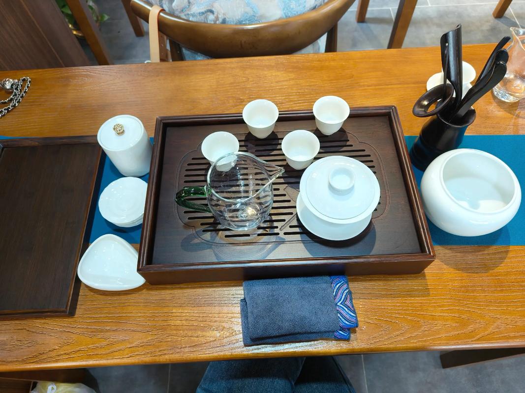 Person choosing between different mechanical keyboards on a desk
